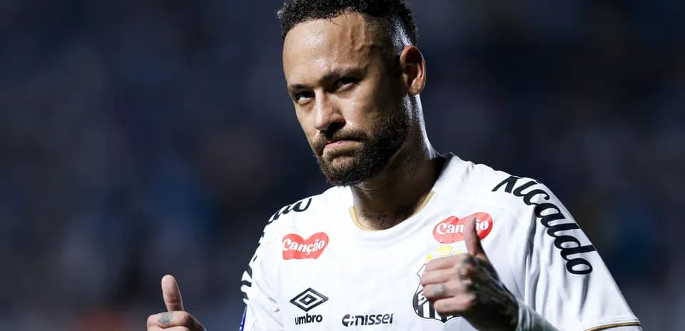 Player giving thumbs up during match celebration