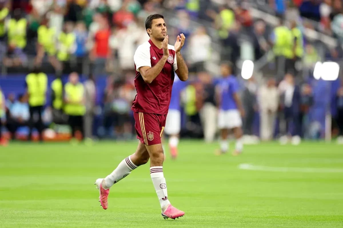 Player applauding fans after a match