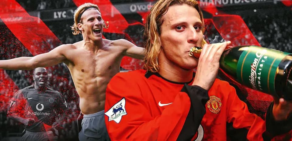 Player celebrating with champagne in Manchester United jersey