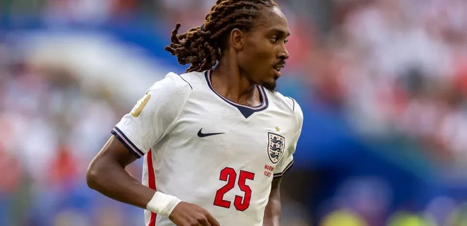 Player wearing England jersey during match action