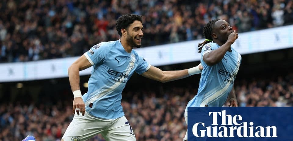 Manchester City players celebrating a goal during match