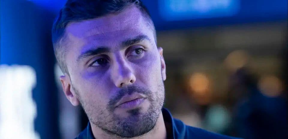 Athlete in a dark environment with blue lighting