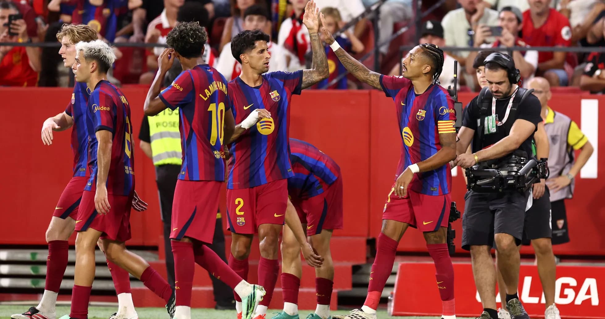 Barcelona players celebrating a goal during match