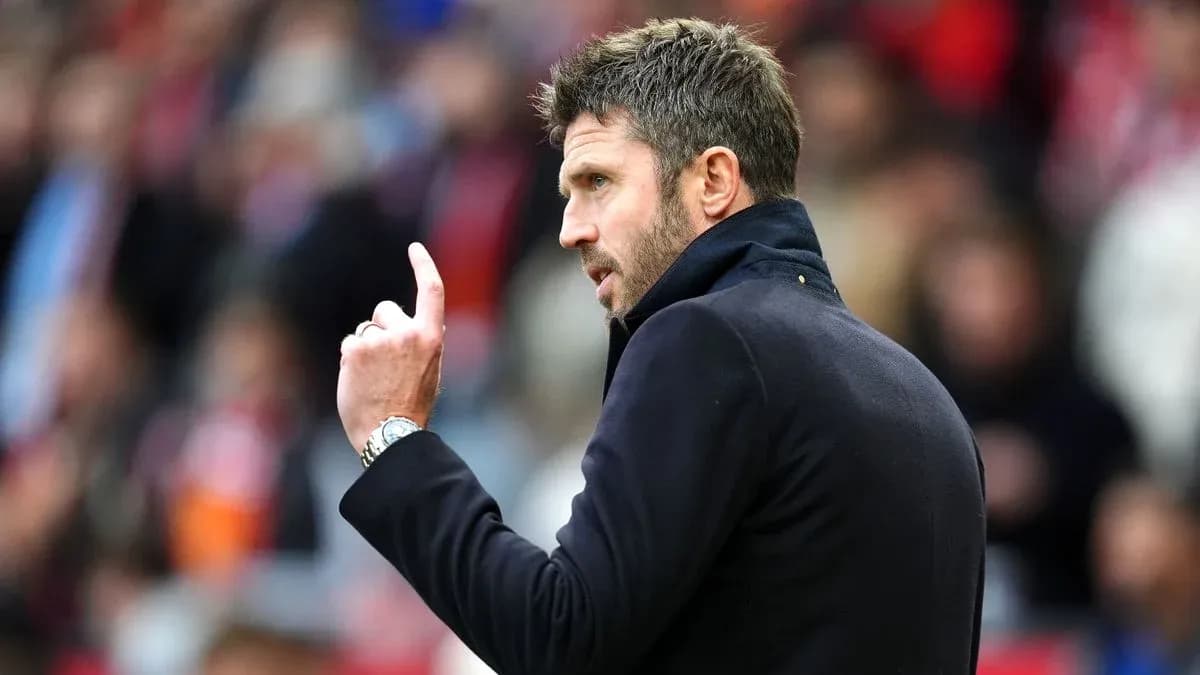 Coach gesturing during a match on the sideline
