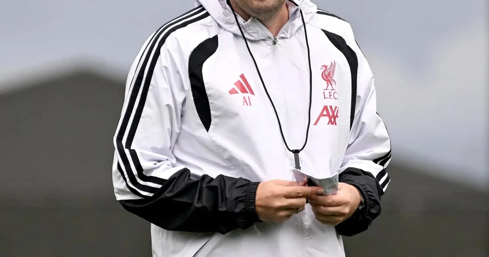 Coach in Liverpool training kit during session