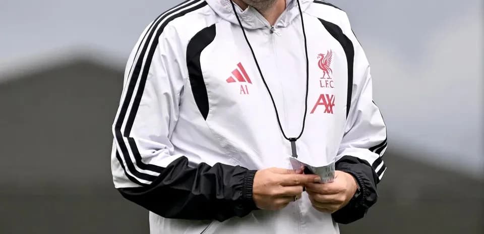 Coach in Liverpool training kit during session