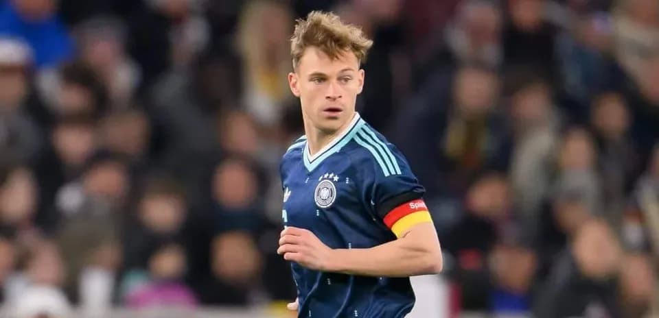 Player wearing Germany kit during match action