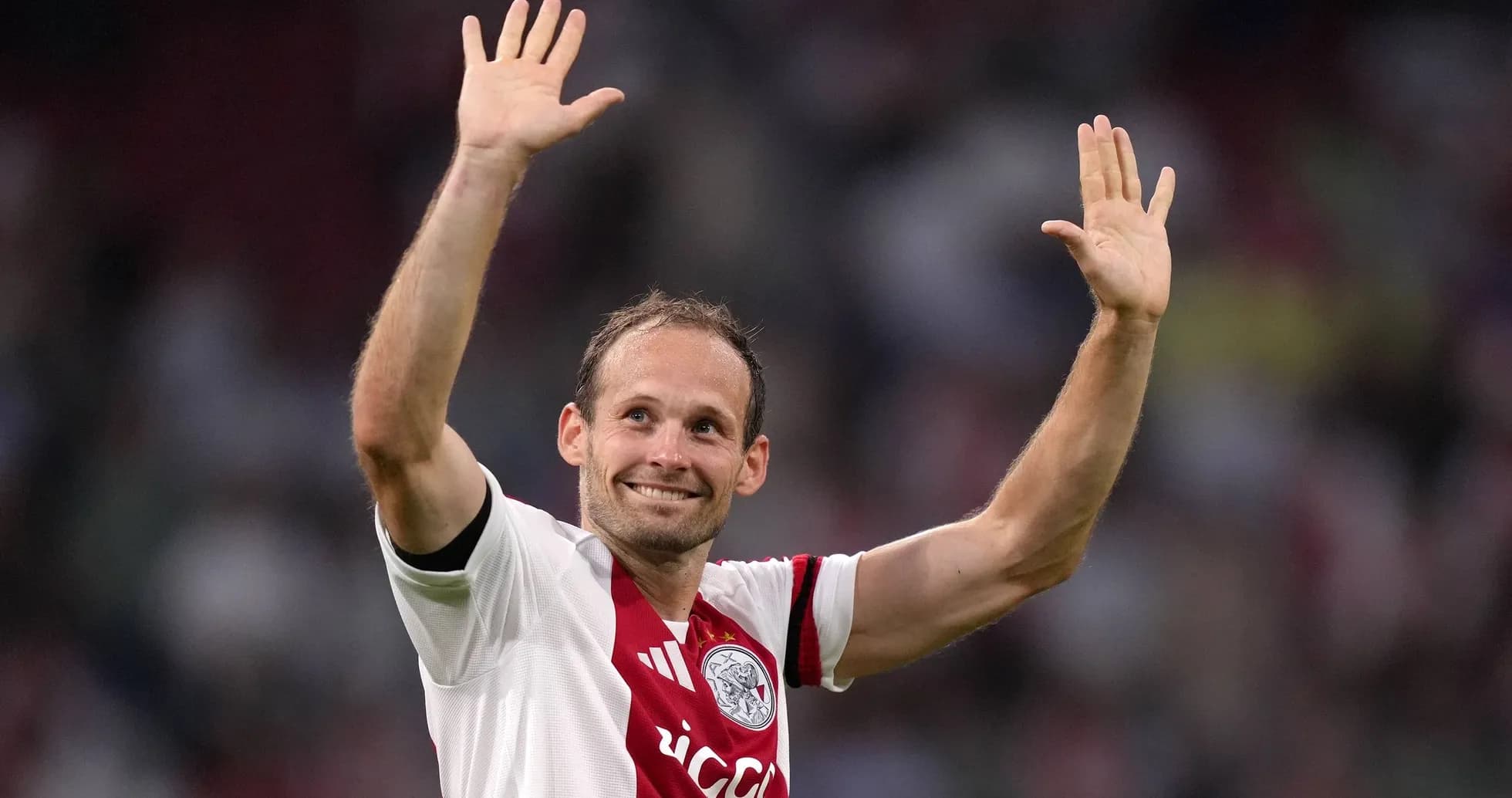 Player waving to fans after a match