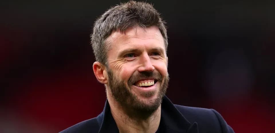 Man smiling in a sports setting