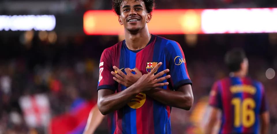 Player celebrating a goal with crossed arms gesture