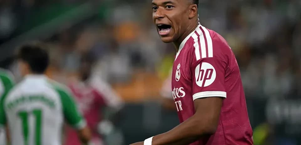 Player celebrating during match in pink jersey