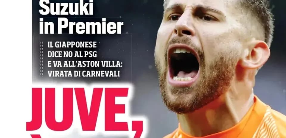 Goalkeeper shouting during a match, wearing an orange jersey
