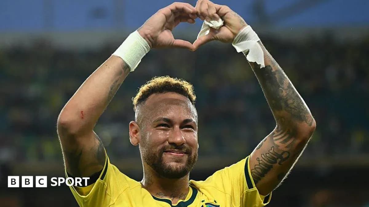 Neymar celebrating with heart gesture after match