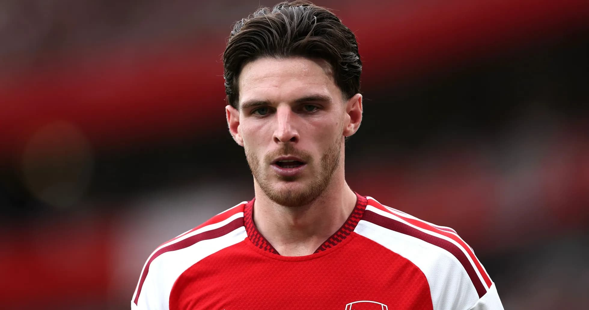 Player in Arsenal jersey during match action