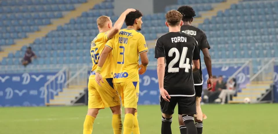 Maccabi Tel Aviv players celebrating on the field