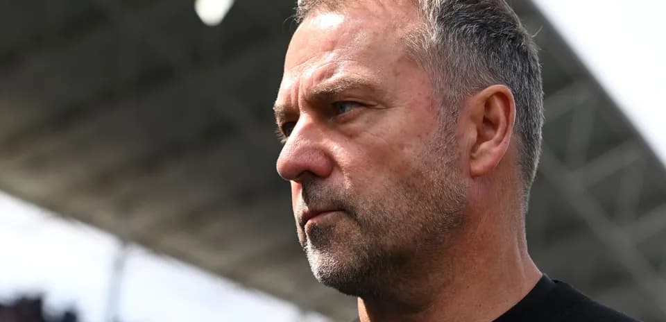 Close-up of a coach looking focused