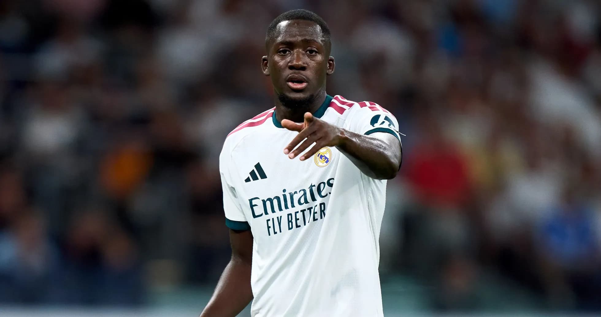 Player gesturing during match in Real Madrid kit