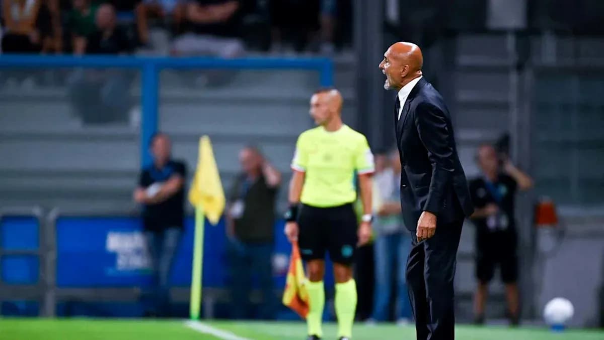 Coach gesturing on the sidelines during match