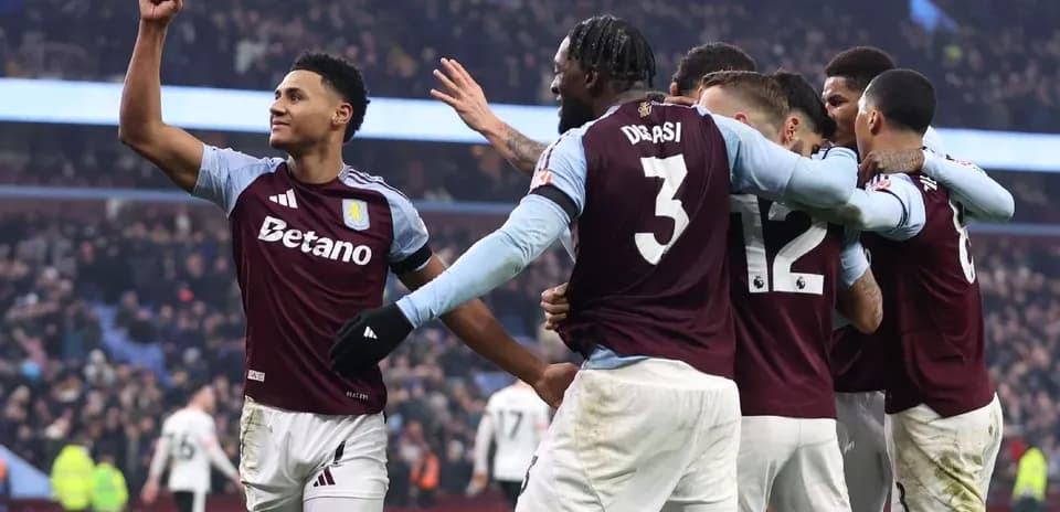 Aston Villa players celebrating a goal during match