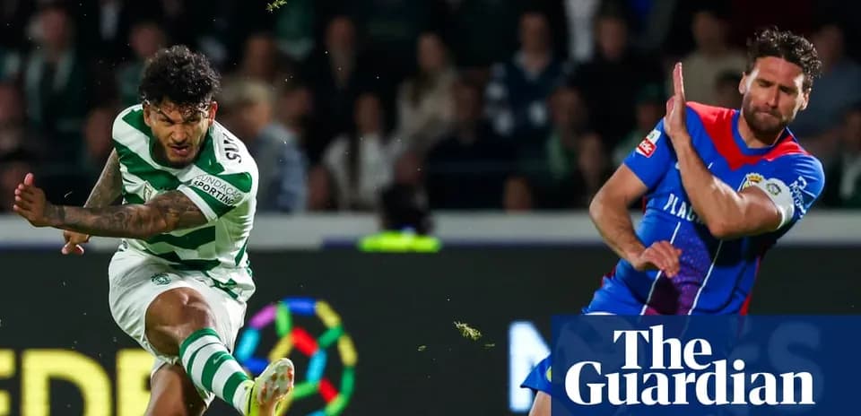 Player striking the ball during a football match