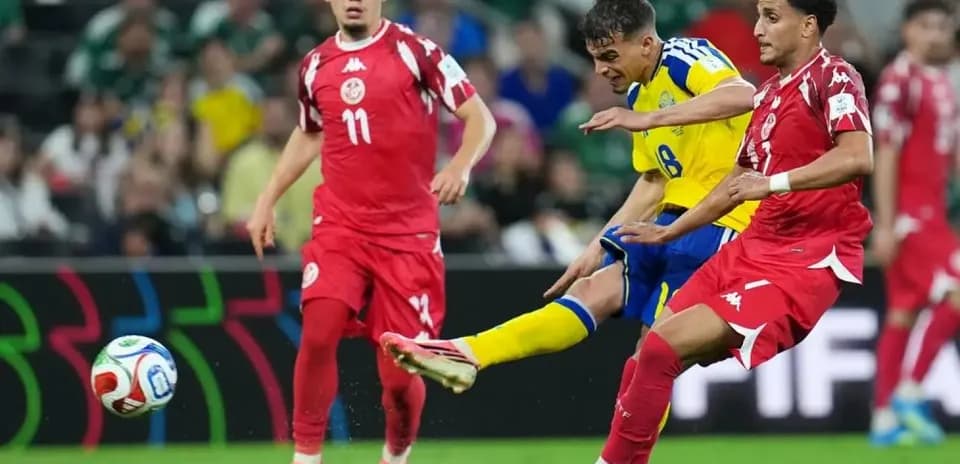 Sweden player shoots against Tunisia in World Cup