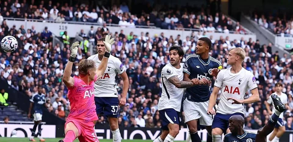 Goalkeeper saves shot during Tottenham vs Newcastle match