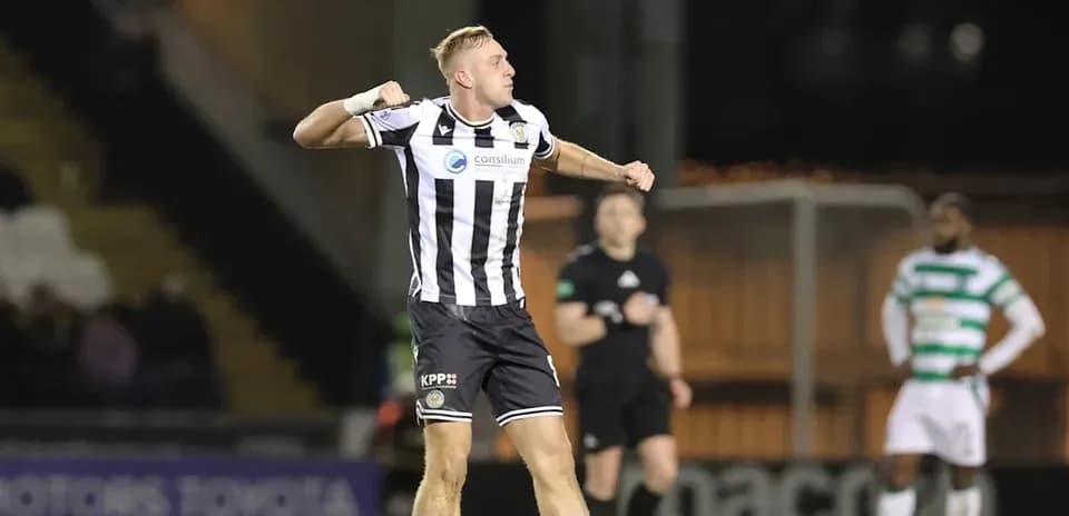 Player celebrating after scoring a goal during match