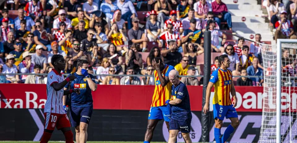Valencia players interacting during La Liga match