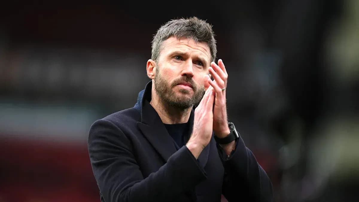 Coach clapping hands in stadium after match