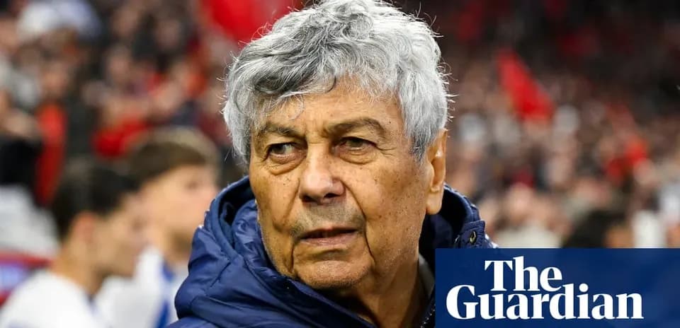 Coach observing match with players in background