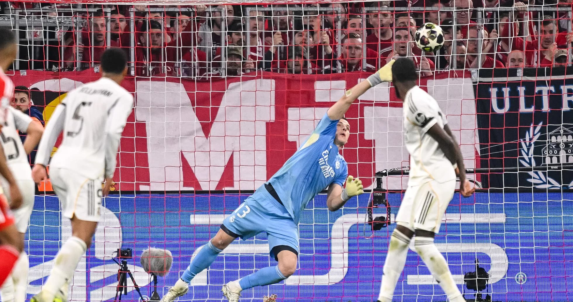 Goalkeeper making a save during Bayern vs Real match