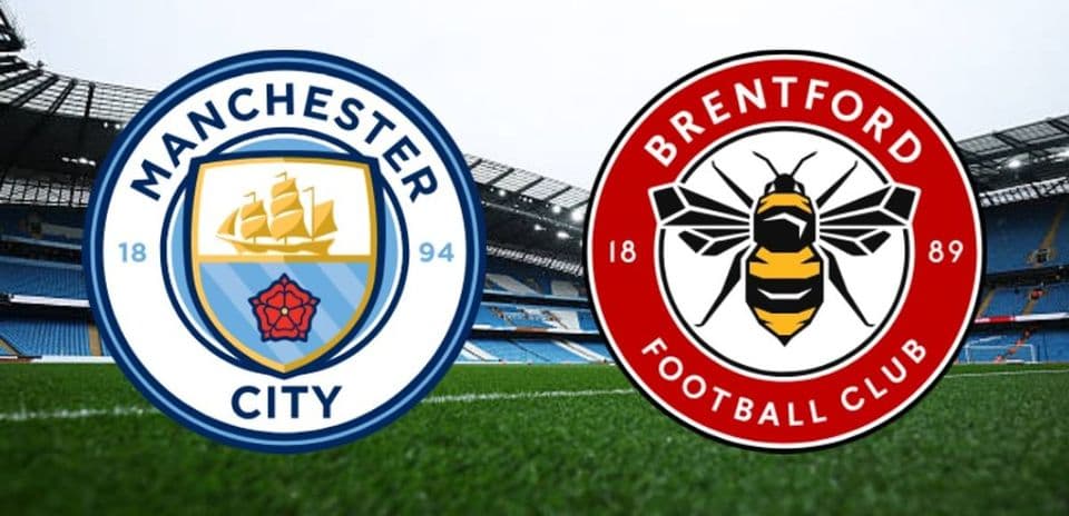 Logos of Manchester City and Brentford on pitch