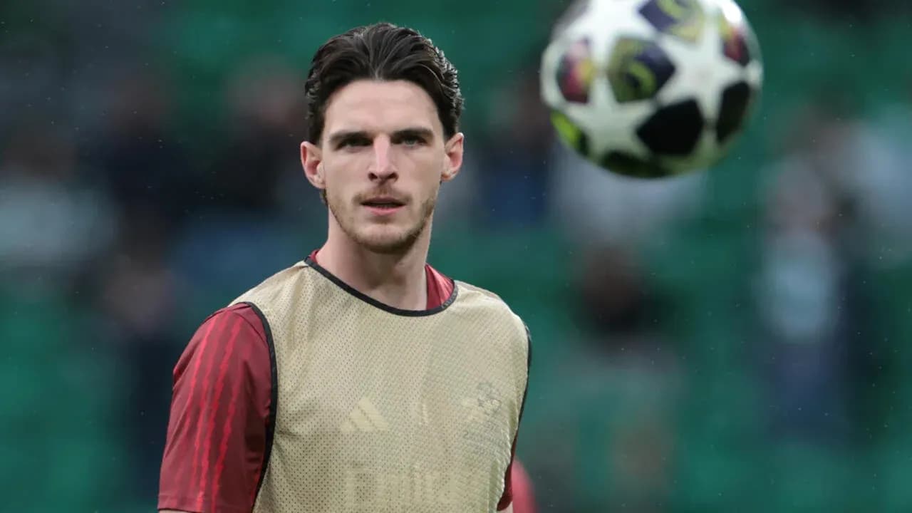 Player warming up with a football during training