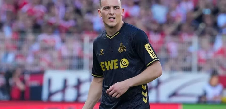 Player in black jersey on the field during match