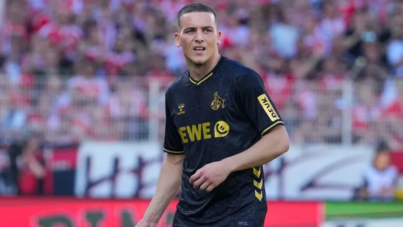 Player in black jersey on the field during match