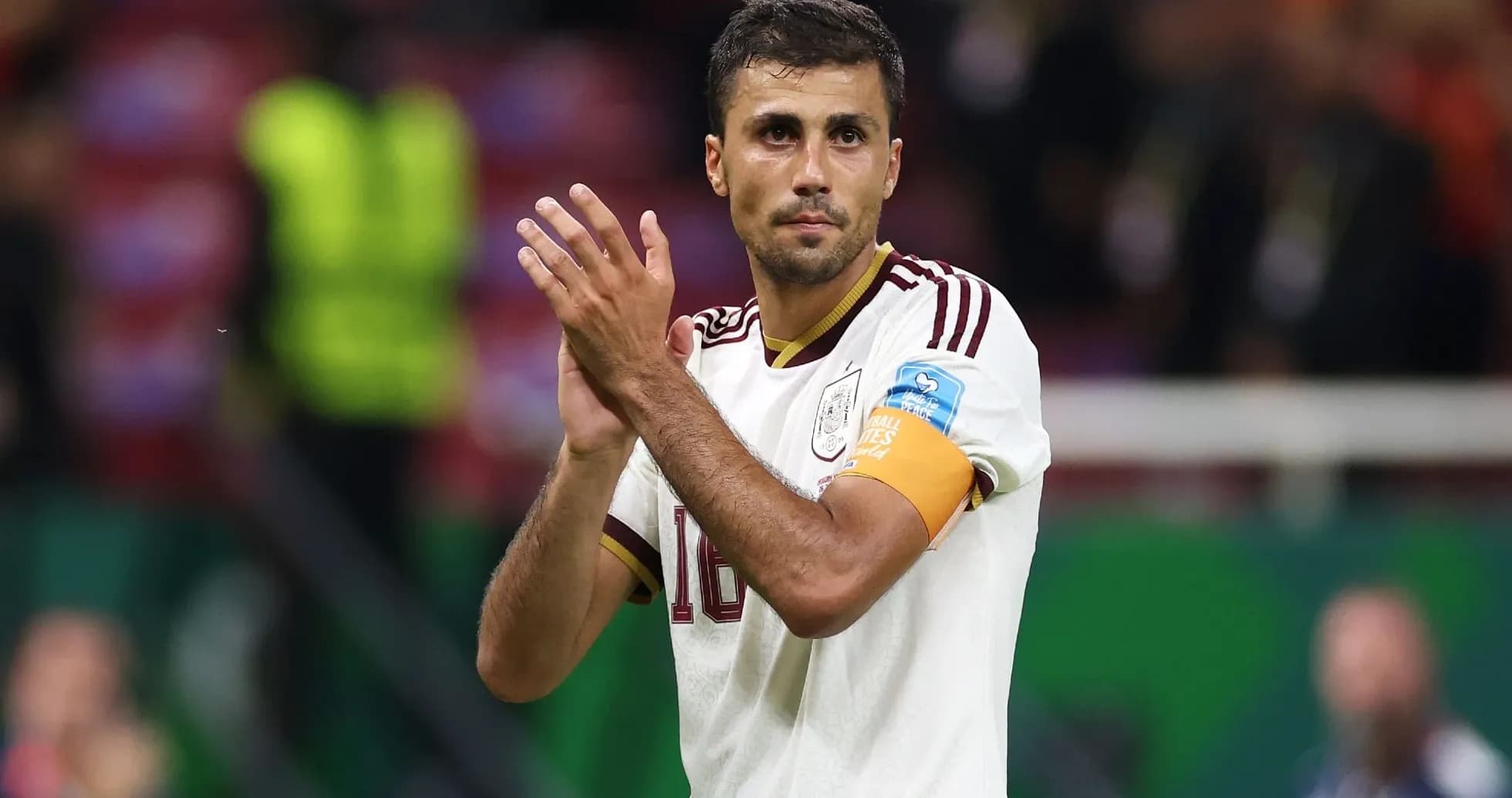 Player applauding fans after the match