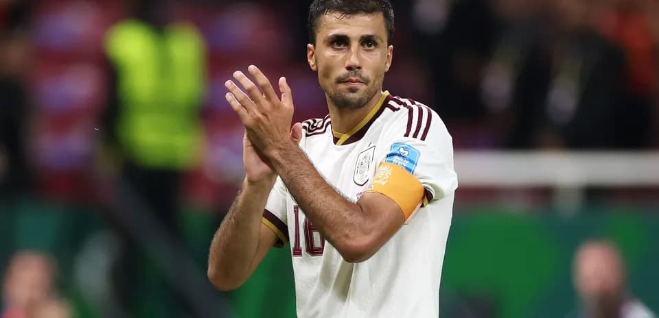 Player applauding fans after the match