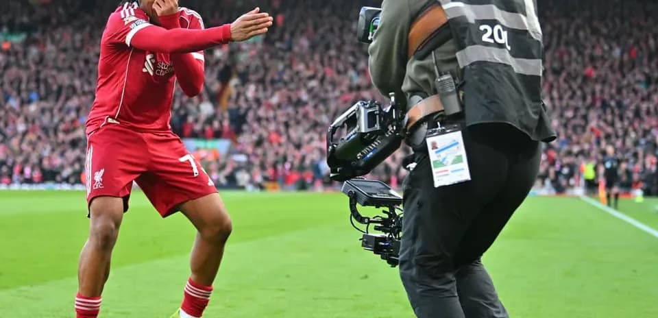 Player celebrating after scoring for Liverpool