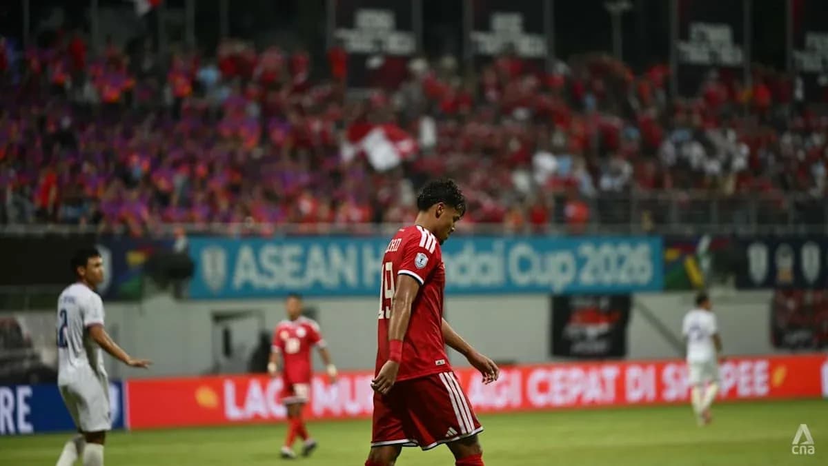 Player walking off field during football match