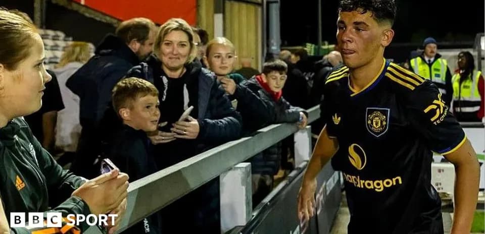 Player walking past fans after the match