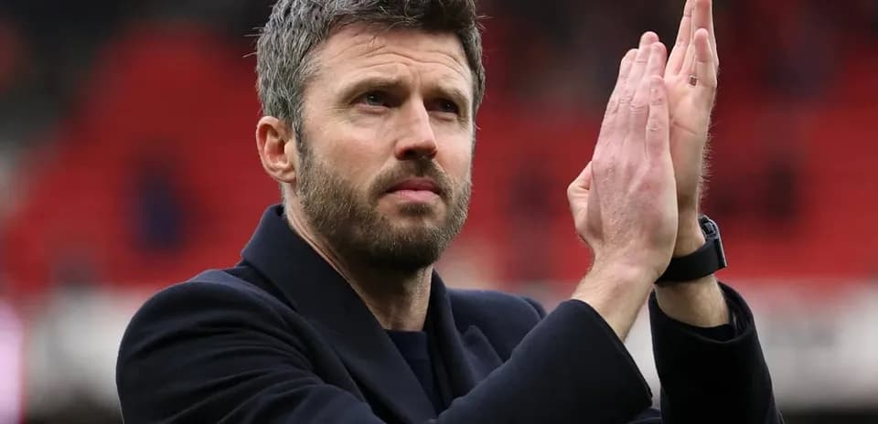 Man applauding in a stadium with red background