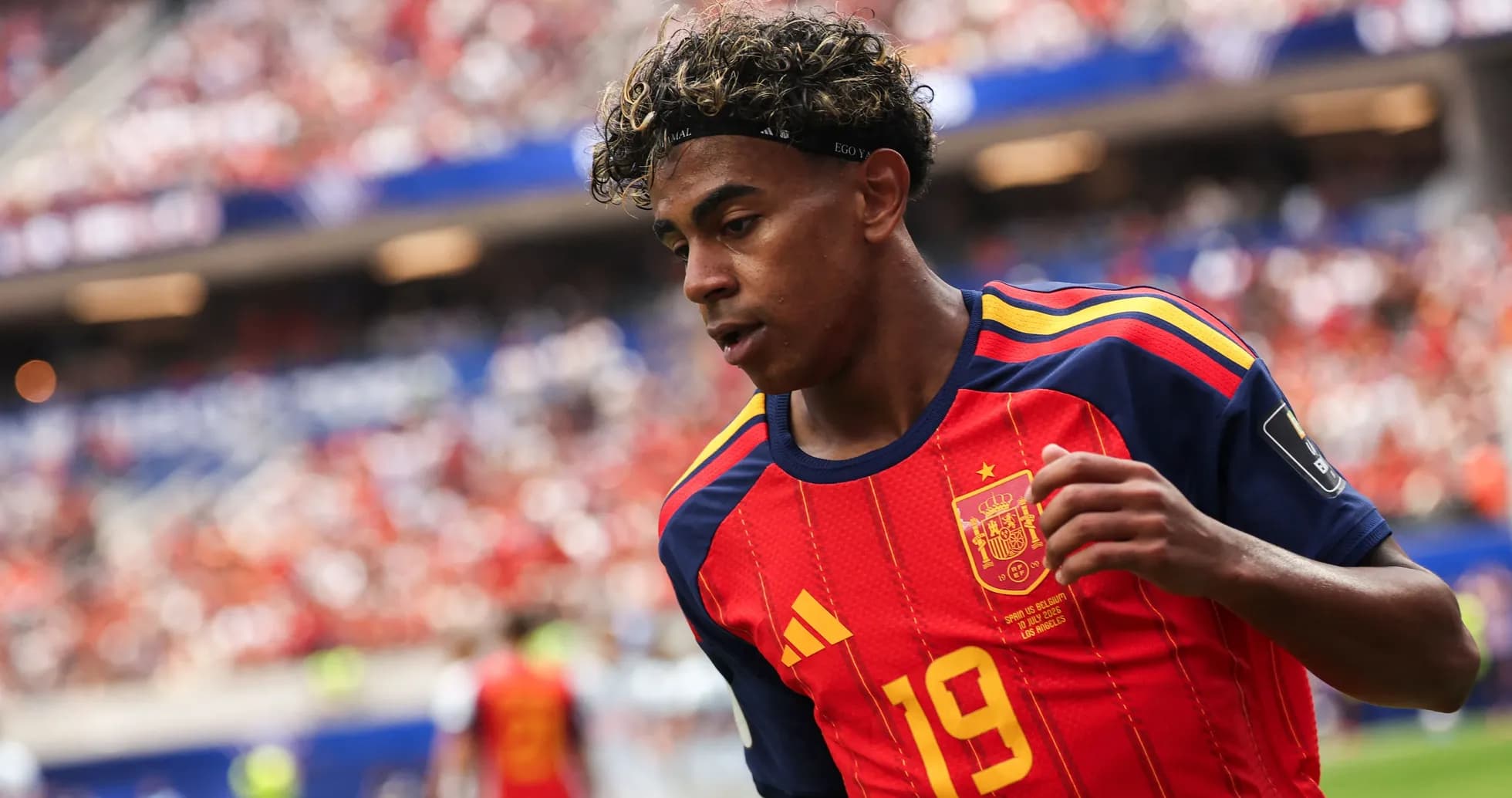 Player wearing Spain jersey during match action