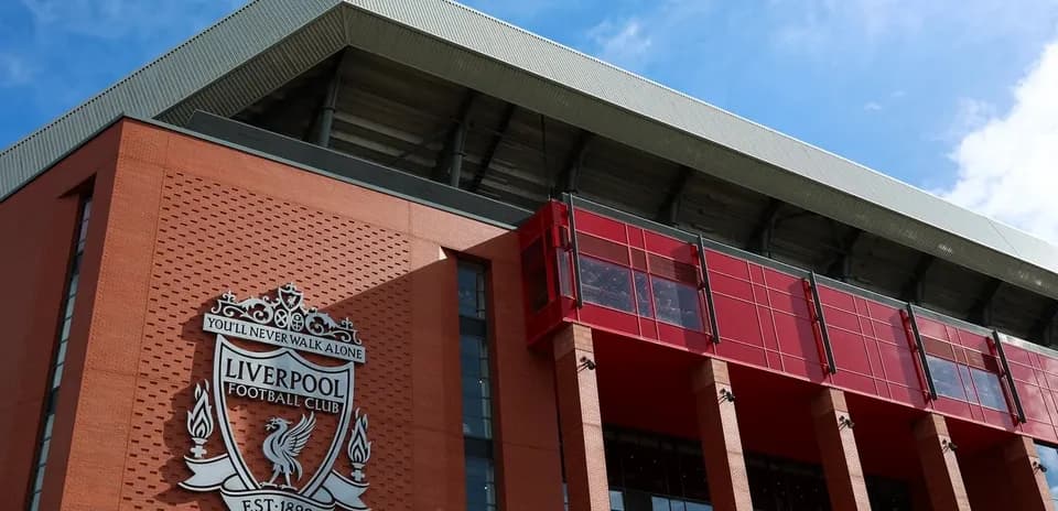 Exterior of Anfield stadium with Liverpool FC crest