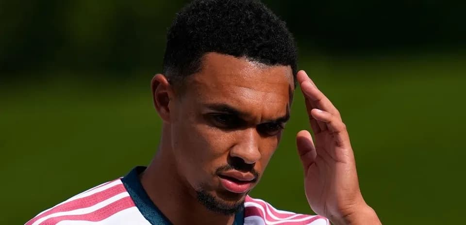 Player touching head during training session outdoors