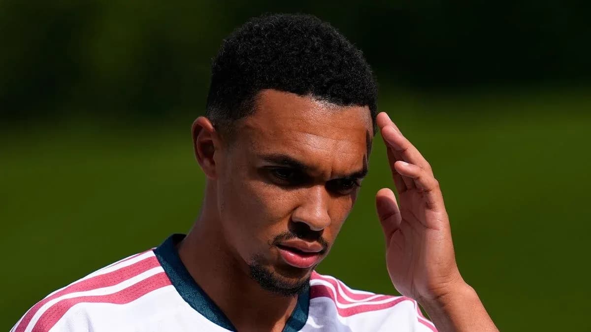 Player touching head during training session outdoors