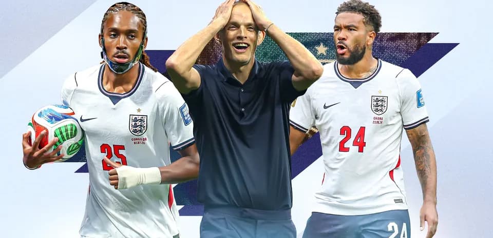 Three soccer players in England jerseys with a coach