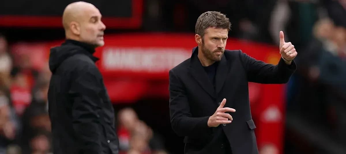 Two football managers on the sidelines during match