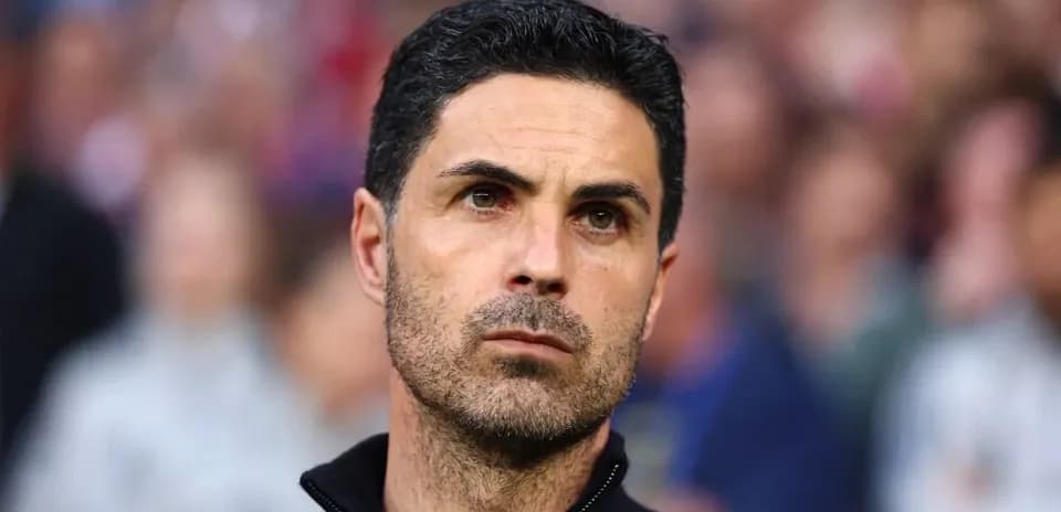 Coach observing the match from the sidelines