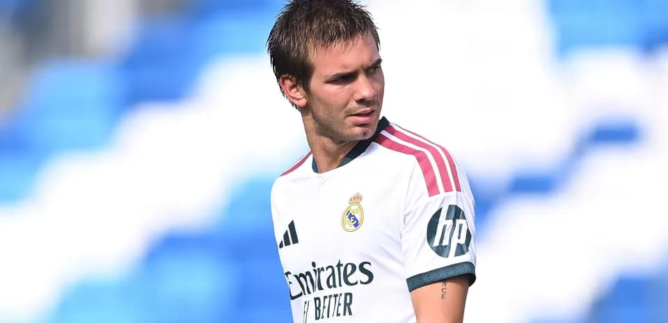 Player in Real Madrid jersey on training pitch