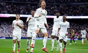 Real Madrid players celebrating a goal during match